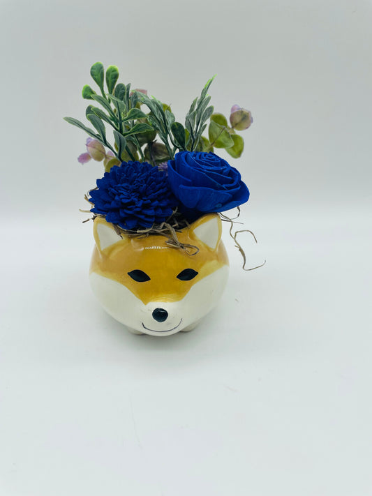 Fox pot with purple flowers