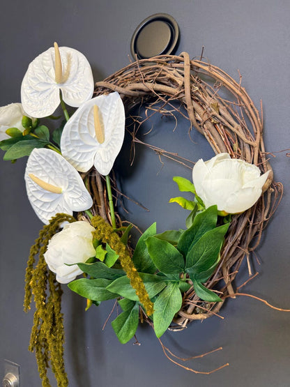 White anthurium peony wreath trailing greenery