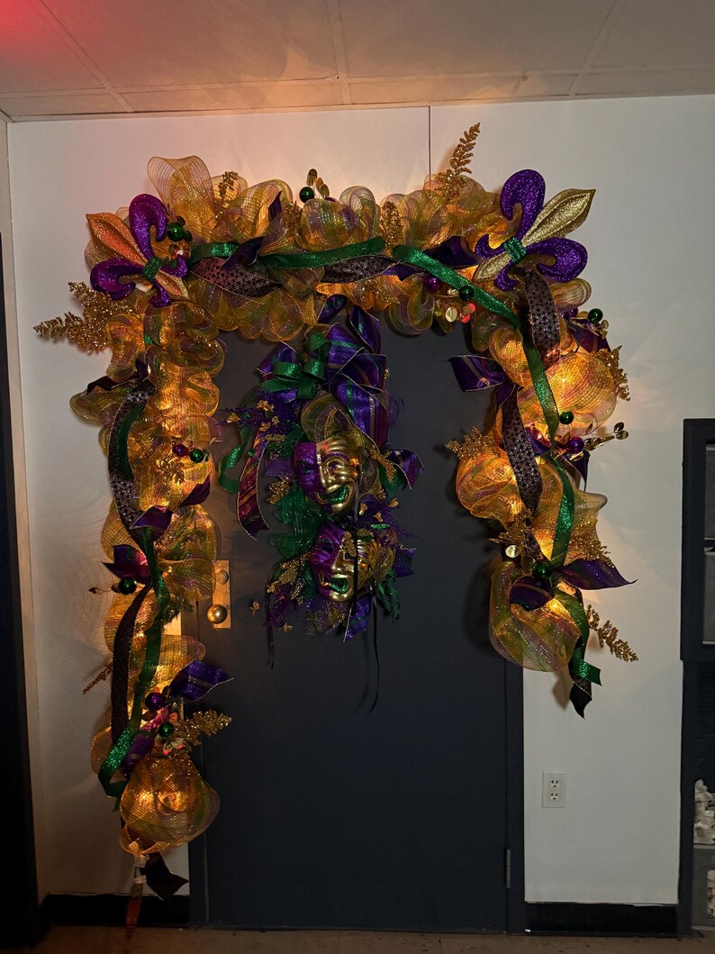 Mardi Gras lighted archway gold mesh purple green