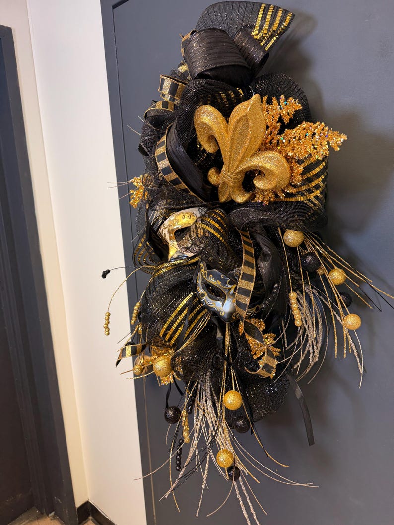 Black gold fleur de lis wreath New Orleans style detail
