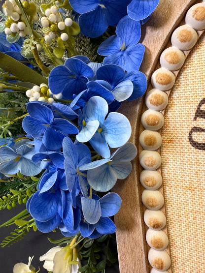 Blue hydrangea floral detail on bunny door hanger