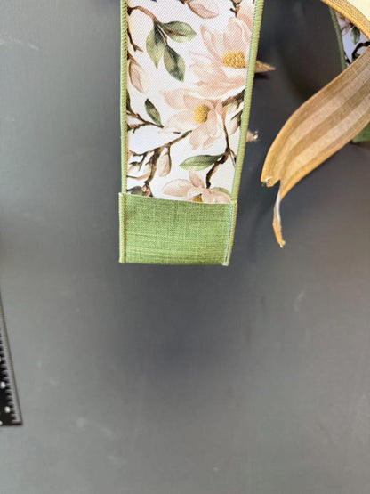 Magnolia floral ribbon sage green gold edge detail