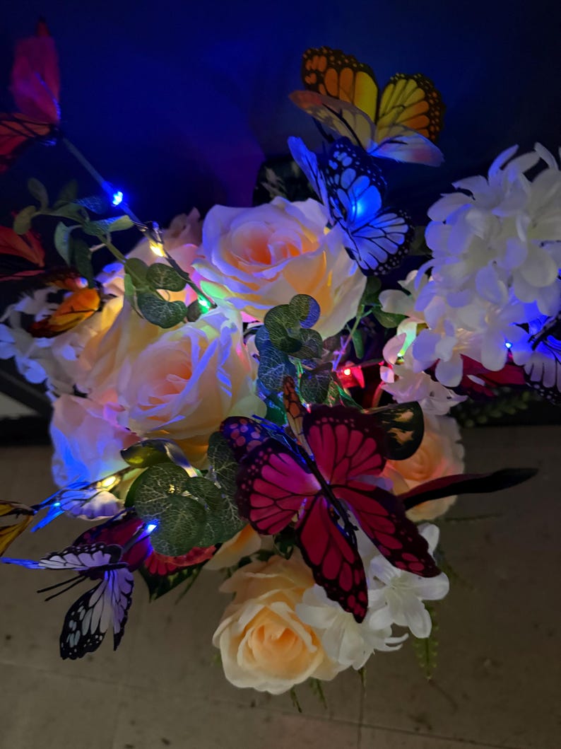 Cemetery grave vase insert with LED lights glowing