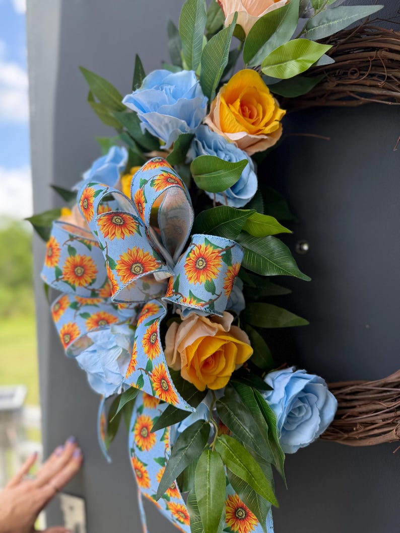 Summer wreath blue yellow roses sunflower ribbon detail