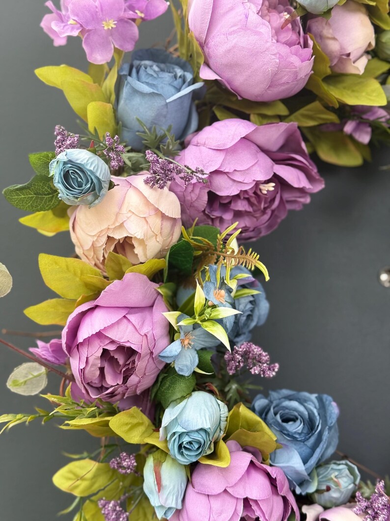 Bayou Dusk wreath purple dusty blue peach floral detail
