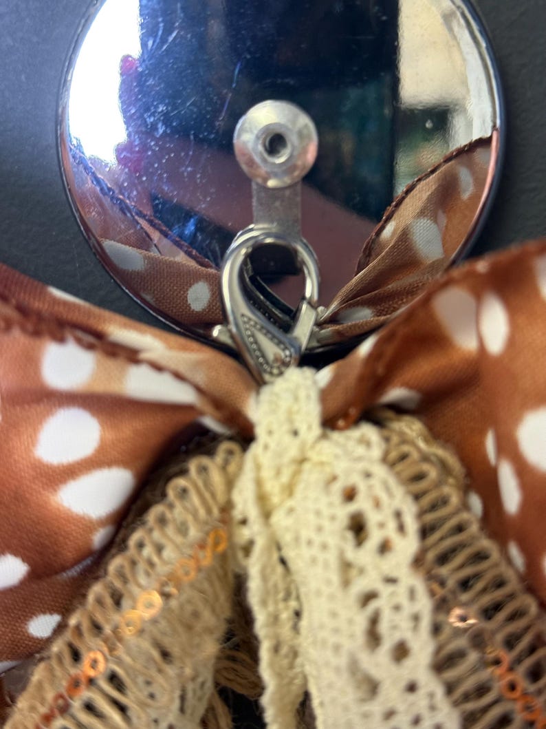 Spotted axis print wreath bow lobster clasp
