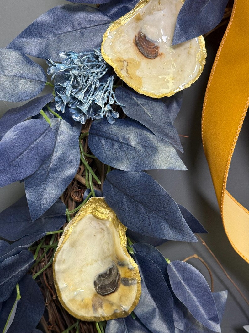 Oyster shell wreath navy leaves gold shell detail