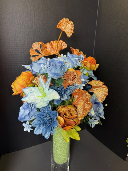 Blue copper graveside memorial silk flower urn arrangement detail